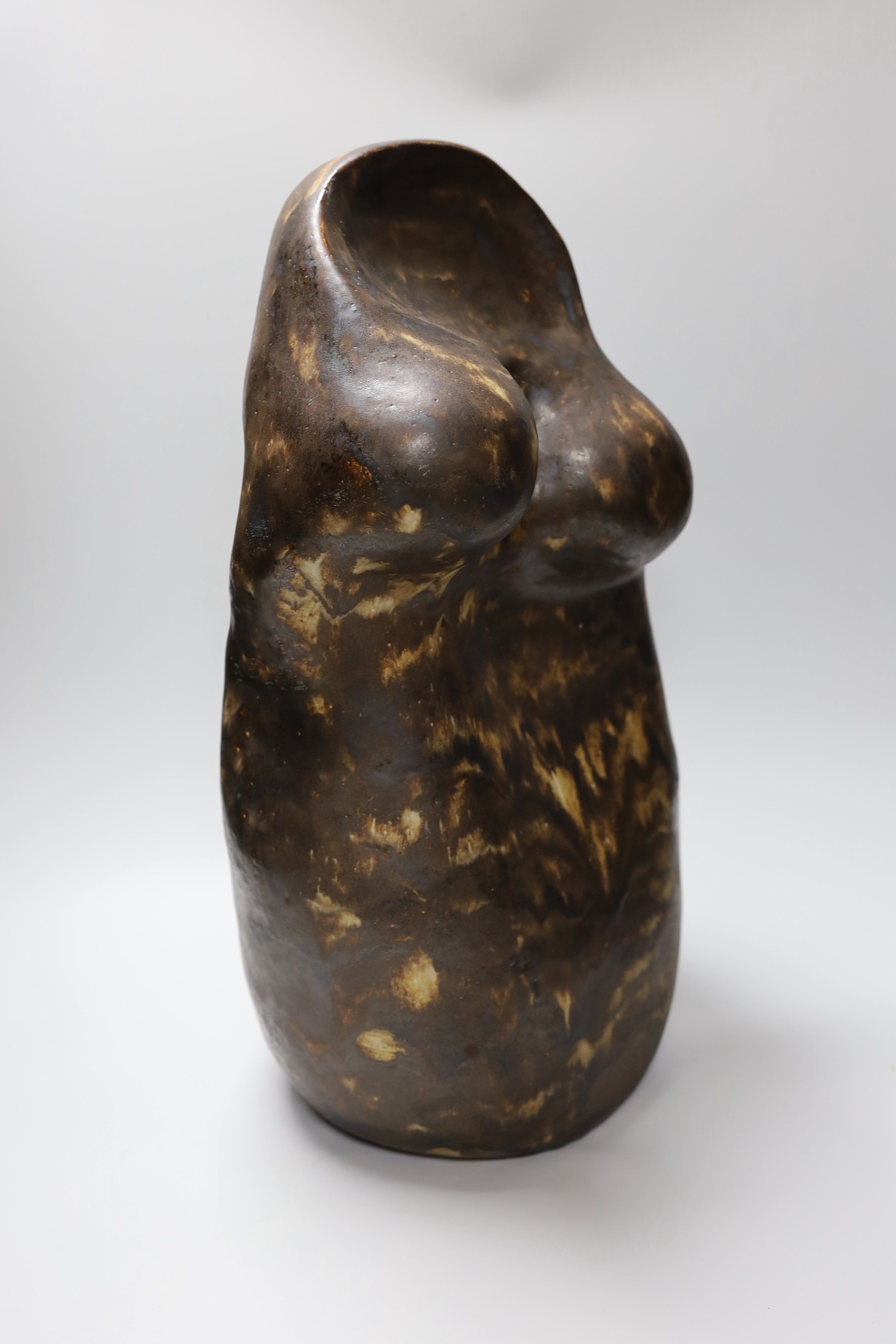 Ruth Sulke - a large studio brown glazed stoneware ’torso’ sculpture, 1986, 54cm, See Sulke, Ruth - Ceramic Sculpture by Ruth Sulke, Hanart 2 Gallery, 1987, page 44.